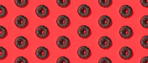 Many Delicious Chocolate Donuts Red Background Top View Pattern Design — Stock Photo, Image