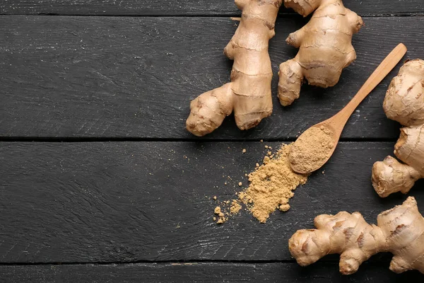 Fresh Ginger Roots Spoon Dried Powder Black Wooden Background — Stock Photo, Image