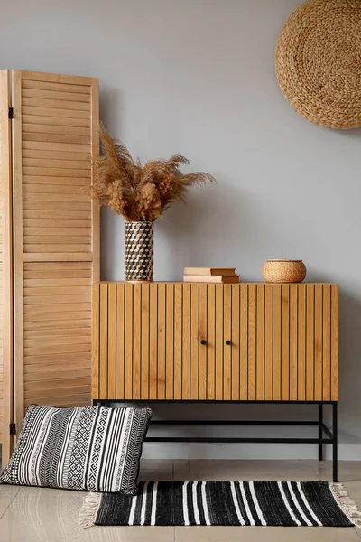 Stylish Wooden Cabinet Pampas Grass Vase Grey Wall — Stock Photo, Image