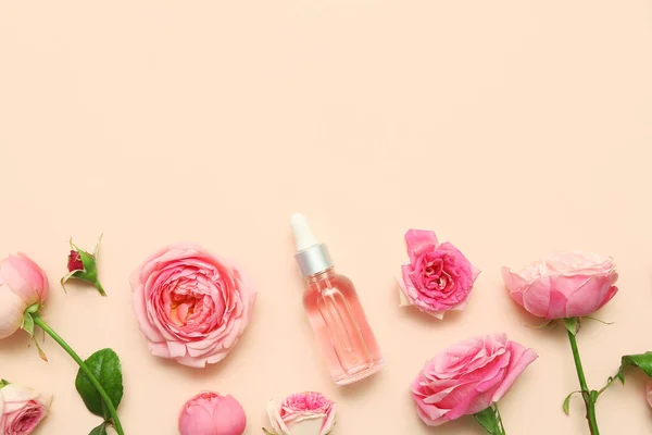 Bottle Cosmetic Oil Rose Extract Flowers Beige Background — Stock Photo, Image