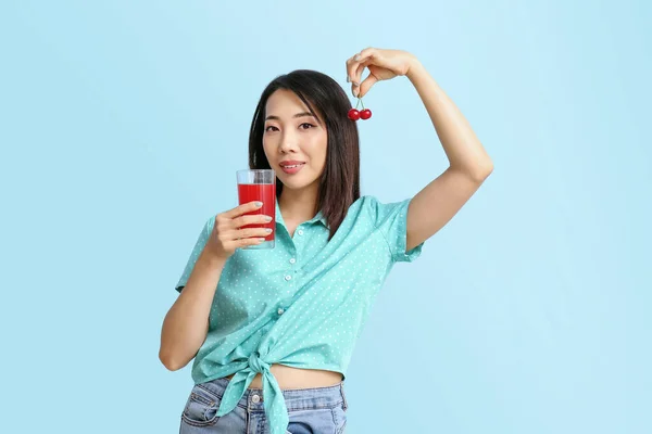 Beautiful Asian Woman Cherry Glass Juice Blue Background — Stock Photo, Image