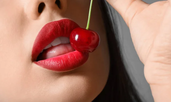 Beautiful Woman Red Lips Cherry Dark Background Closeup — Stock Photo, Image
