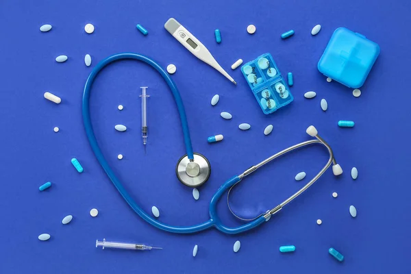 Stethoscope Syringes Pills Digital Thermometer Blue Background — Stock Photo, Image