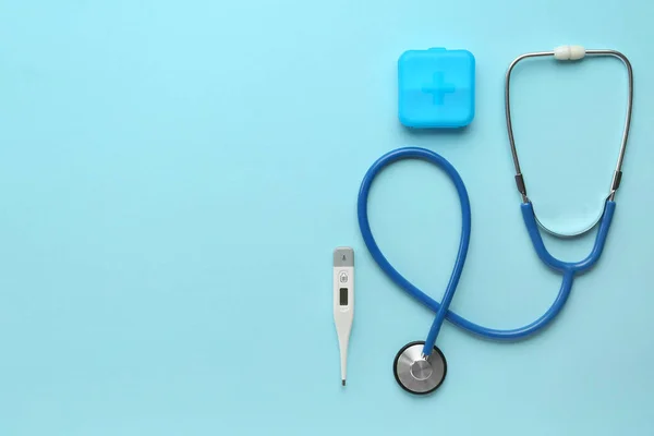Medical Stethoscope Digital Thermometer Blue Background — Stock Photo, Image