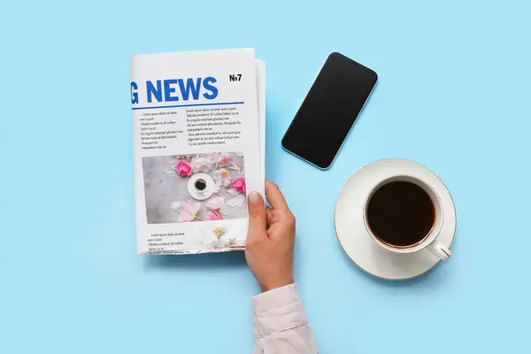 Woman Reading Newspaper Coffee Mobile Phone Blue Background — Stock Photo, Image