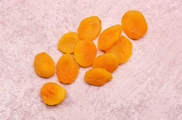 Tasty Dried Apricots Pink Background — Stock Photo, Image