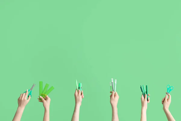 Hands School Accessories Green Background — Stock Photo, Image