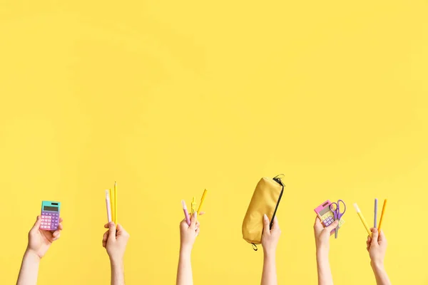 Hands School Supplies Yellow Background — Stock Fotó