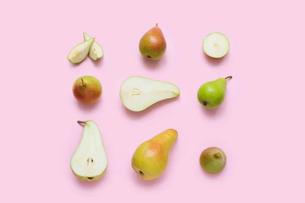 Different Types Ripe Pears Pink Background — Stock Photo, Image
