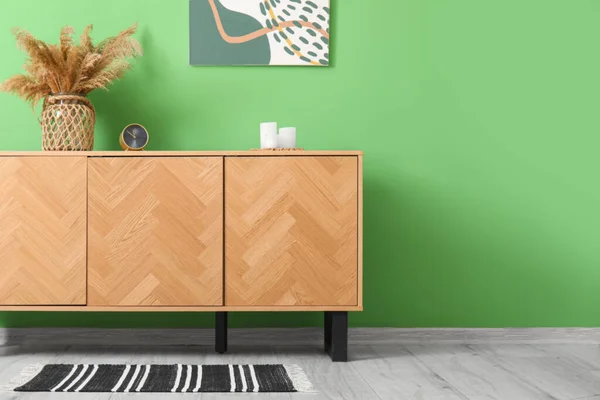Stylish Wooden Cabinet Green Wall — Stock Photo, Image
