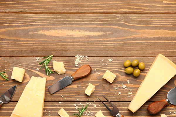 Pieces Tasty Parmesan Cheese Wooden Background — Stock Photo, Image