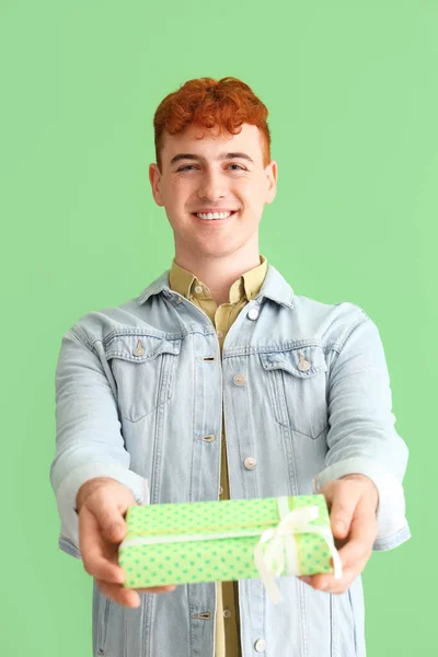 Young Redhead Man Gift Box Green Background — Stock Photo, Image
