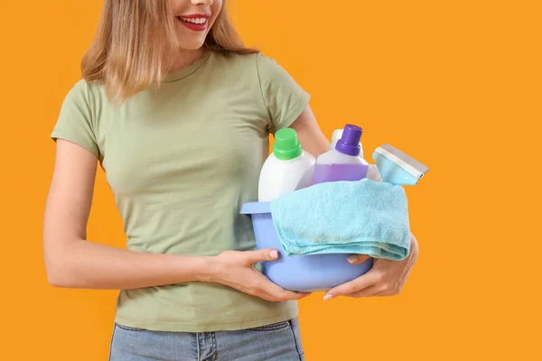 Young Woman Cleaning Supplies Orange Background Closeup — Stock Photo, Image