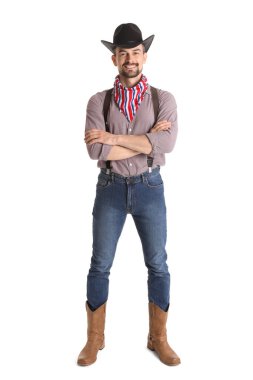 Beyaz arka planda yakışıklı kovboy