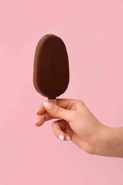 Woman Holding Delicious Chocolate Covered Ice Cream Stick Pink Background — Stock Photo, Image