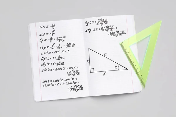 Copybook Con Fórmulas Matemáticas Regla Sobre Fondo Gris —  Fotos de Stock