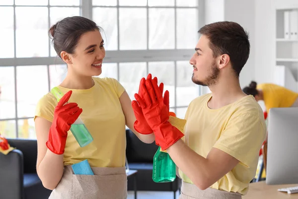 Young Janitors Bottles Detergent Giving Each Other High Five Office — Stock Photo, Image