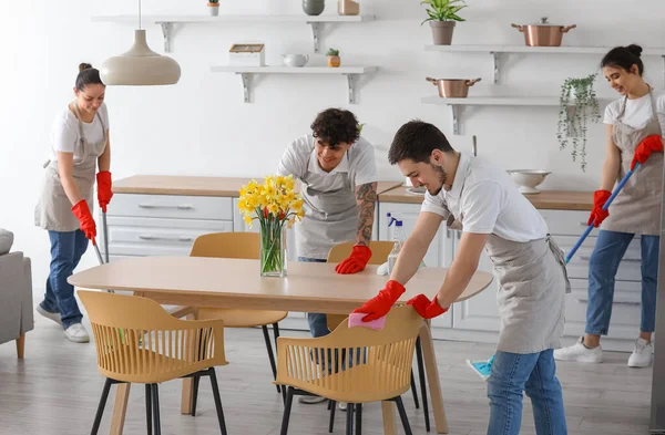 Young Janitors Cleaning Kitchen — Stock fotografie
