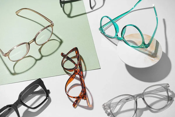 Many Different Stylish Eyeglasses Color Background — Stock Photo, Image