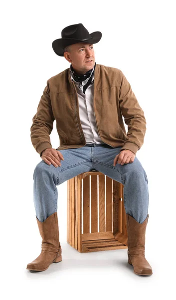 Reifer Cowboy Sitzt Auf Weißem Hintergrund — Stockfoto