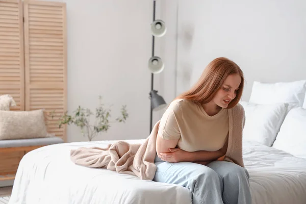 Young Woman Having Menstrual Cramps Bedroom — Stockfoto