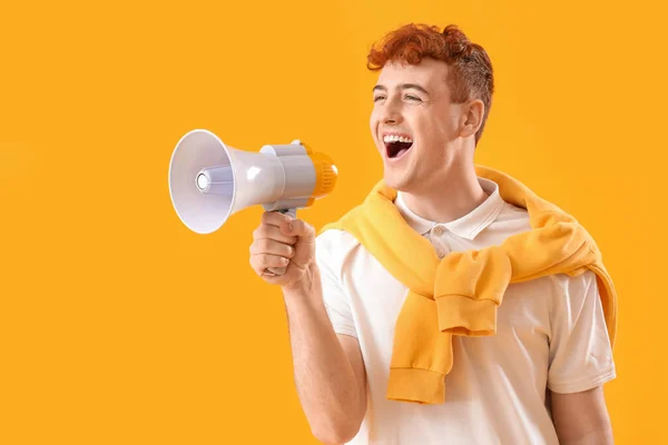 Young Redhead Man Shouting Megaphone Yellow Background — Stock Photo, Image