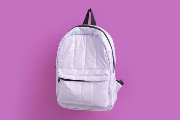 stock image Lilac school backpack on purple background