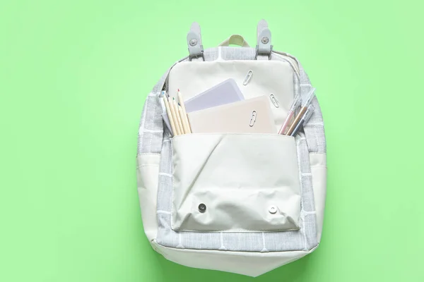 Grey School Backpack Different Stationery Green Background — Stock Photo, Image