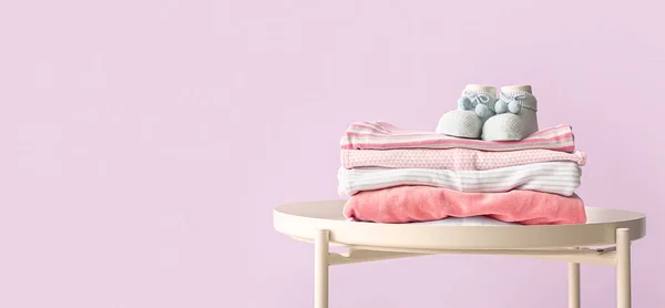 Stack Baby Clothes Socks Table Lilac Background Space Text — Stock Photo, Image