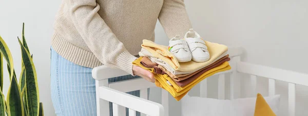 Woman Baby Clothes Booties Home — Stock Photo, Image