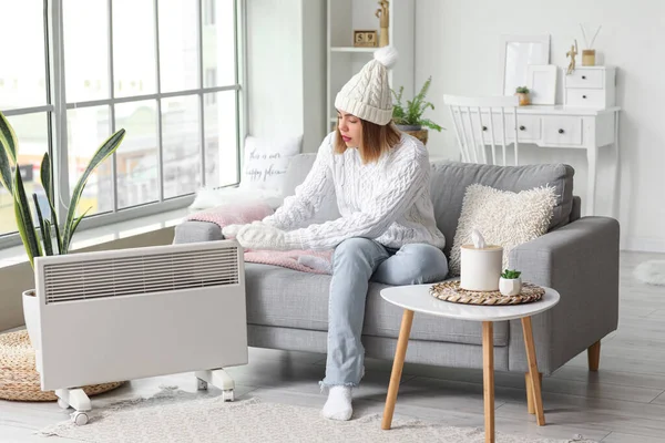 Frozen Young Woman Winter Clothes Warming Radiator Home — 스톡 사진