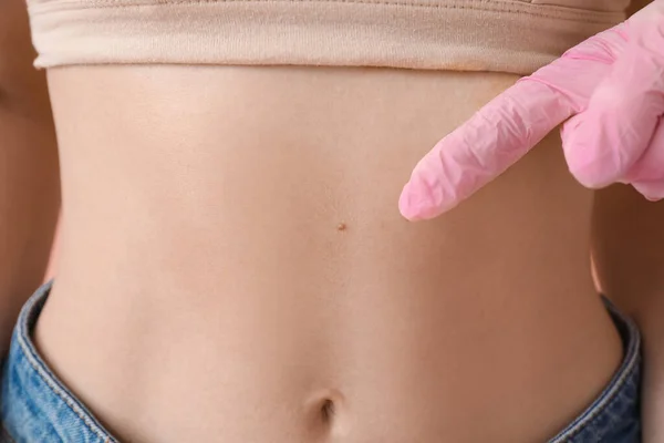 Dermatologist Examining Young Woman Moles Pink Background Closeup — Stock Photo, Image