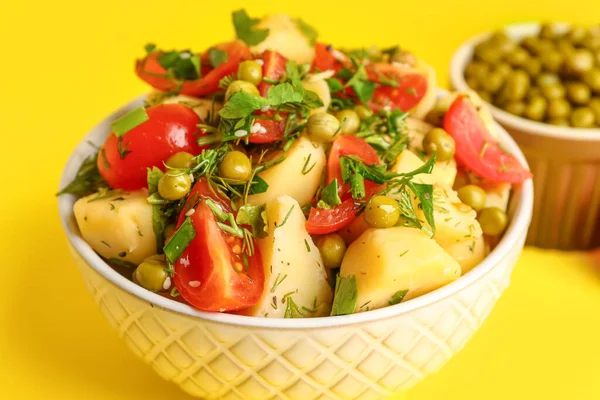 Bowl Tasty Potato Salad Vegetables Yellow Background Closeup — Stock Photo, Image
