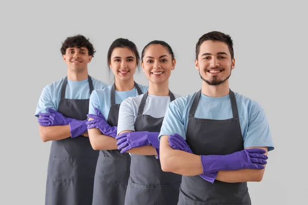 Young Janitors Grey Background — Stock Photo, Image