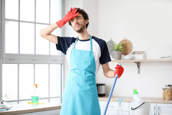 Tired Young Man Mopping Floor Kitchen — Stock Photo, Image