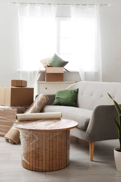 Sofa Wrapped Table Cardboard Boxes Living Room Moving Day — Stock Photo, Image