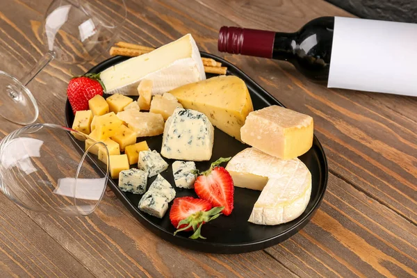 Pieces Tasty Cheese Glasses Bottle Wine Wooden Background — Stock Photo, Image