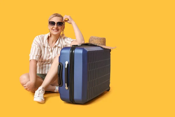 Mature Woman Suitcase Sitting Yellow Background — Stock Photo, Image