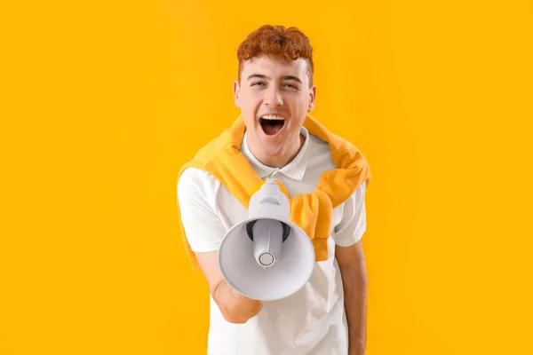 Young Redhead Man Shouting Megaphone Yellow Background — Stock Photo, Image