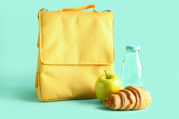 Lunch Box Bag Apple Croissant Bottle Water Turquoise Background — Stock Photo, Image