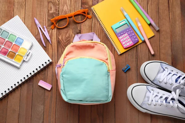 Colorful School Backpack Eyeglasses Sneakers Different Stationery Wooden Background — Stock Photo, Image