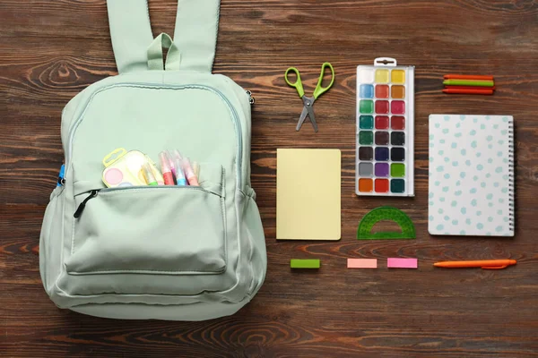 Green School Backpack Watercolors Markers Notebooks Wooden Background — Stock Photo, Image