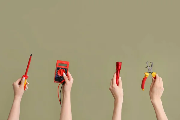 Electrician Hands Tools Green Background — Fotografia de Stock