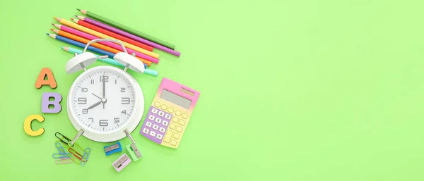 Alarm Clock School Stationery Calculator Green Background Space Text — Stock Photo, Image
