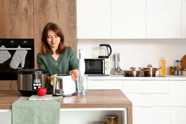 Young Woman Cleaning Electric Toaster Light Kitchen — Stock Photo, Image