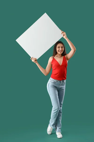 Young Woman Big Blank Poster Green Background — Stock Photo, Image