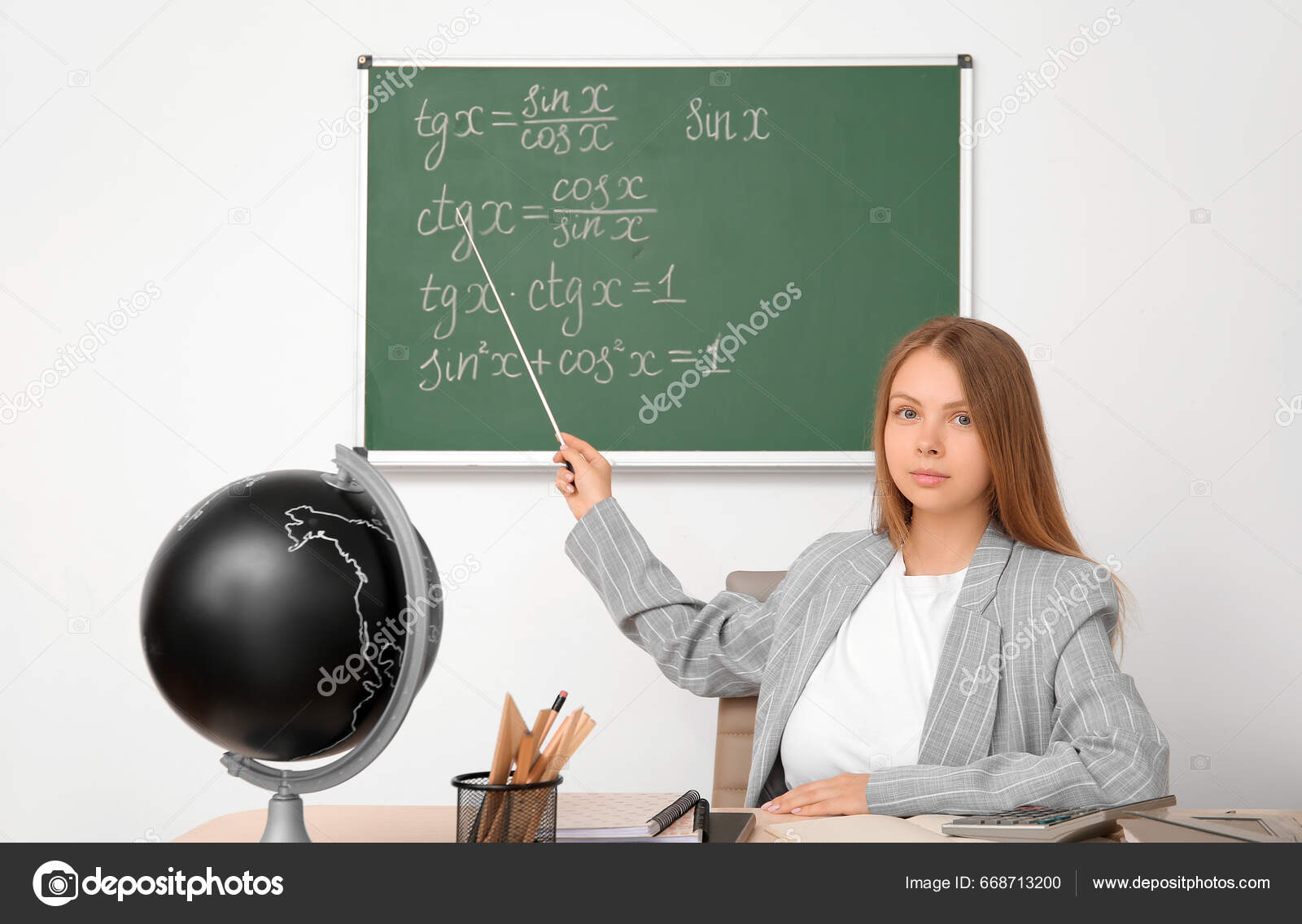 Young Math Teacher Pointer Sitting Wooden Table Classroom — Stock Photo ...