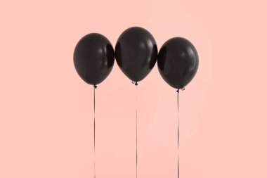 Bej arkaplanda siyah Cadılar Bayramı balonları