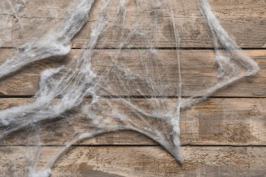 Tahta arka planda örümcek ağı. Cadılar Bayramı