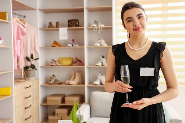 Female Sales Assistant Glass Champagne Boutique — Stock Photo, Image